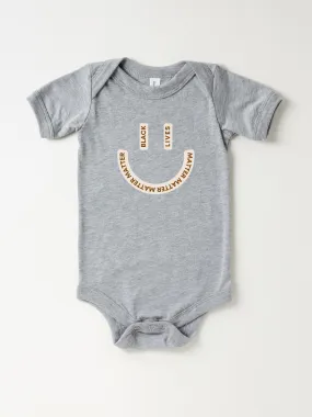 Black Lives Matter Smiley Face - Bodysuit